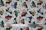 Flat swatch Tossed Golf Carts fabric (white fabric with tossed green, red, blue and yellow golf carts and flags, tossed golf balls and clubs)