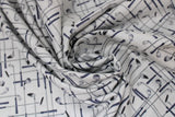 Swirled swatch Clubs fabric (white fabric with collaged golf clubs allover both horizontally and vertically)