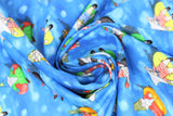 Swirled swatch garden gnome themed fabric in gnomes swimming (medium blue marbled water look fabric with cartoon garden gnomes on floating tubes, assorted colours)