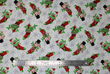 Flat swatch Stockings fabric (white fabric with tossed red christmas stockings with green accents filled with presents, snowmen, etc. and tossed white snowflakes)