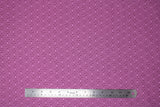 Flat swatch pink fret fabric (pale medium rose pink with dark pink geometric outline pattern with linked/hexagon/honey comb style print allover)