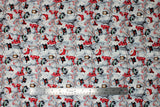 Flat swatch Snowmen fabric (busy collaged cartoon style snowmen allover in black and red hats, white and red scarves)