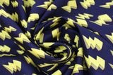 Swirled swatch yellow fabric (black fabric with tossed yellow 3D drawing style lightning bolts)