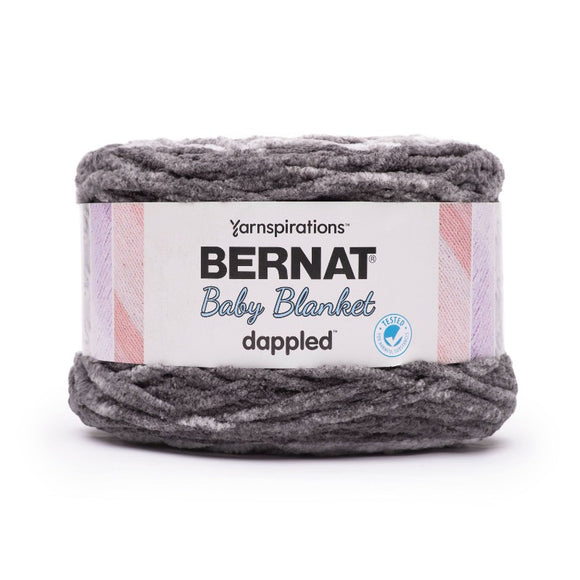 Cake of Bernat Baby Blanket Dappled yarn in shade Charcoal (grey speckled colour effect)