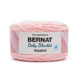 Cake of Bernat Baby Blanket Dappled yarn in shade Ever After Pink (baby pink and white)