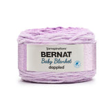 Cake of Bernat Baby Blanket Dappled yarn in shade Crocus Faerie (pale purple ombre)