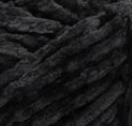Swatch of Bernat Velvet yarn in shade blackbird (black)