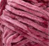Swatch of Bernat Velvet yarn in shade pomegranate (pale dark pink/purple)