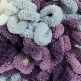 Thistle (purple, mauve and grey) swatch of Bernat Alize Blanket EZ looped yarn