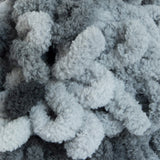Slate Grays (dark, mid and light grays) swatch of Bernat Alize Blanket EZ looped yarn