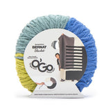 Blanket O'Go yarn ball in colourway Scuba (pale grey blue, pale lime, medium blue sections) in packaging