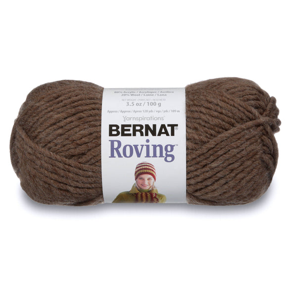A ball of Bernat Roving yarn in brown shade on white background