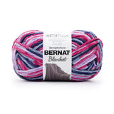 Ball of Bernat Blanket yarn in shade Tourmaline (light purple, hot pink, dark purple and grey shades)