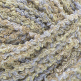 Swatch of Bernat Tweedie yarn in shade summer rain (white/pale yellow/tan colourway with tweed like texture)