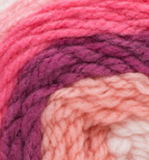 Swatch of Bernat Pop! yarn in shade strawberry fields (white, light to dark pink ombre colourway)