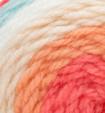 Swatch of Bernat Pop! yarn in shade kitchen kitsch (white, off white, peach, pale medium pink, light blue colourway)