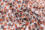 Swirled swatch footballs white fabric (white fabric with small tossed brown footballs allover and orange/black number/letter signs)