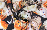 Swirled swatch Stacked Kitties fabric (collaged kittens in various colourings allover)