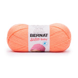 Ball of Bernat Softee Baby yarn in shade cantaloupe (pale medium orange) 