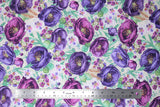 Flat swatch violette fabric in mixed violettes white (white fabric with tossed purple violet heads in various purples and small floral and greenery layered)