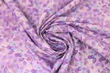 Swirled swatch violette fabric in purple leaves
