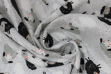 Swirled swatch sheep fabric (white fabric with grey tiny polka dots allover and all white cloud cut outs, with tossed white, grey, and black cartoon sheep allover)
