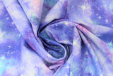 Swirled swatch galaxy fabric (medium purple marbled fabric with light purple, blue, and pink pale cloud shapes and shining white stars tossed allover)