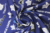 Swirled swatch NHL printed fabric in Toronto Maple Leafs (multi logo on dark blue)