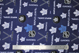 Flat swatch NHL printed fabric in Toronto Maple Leafs (multi logo on dark blue)