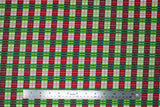 Flat swatch Plaid fabric (white, greens, and red plaid in small squares)
