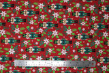 Flat swatch Poinsettia fabric (red fabric with tossed white Poinsettia floral and greenery, and tossed green nutcrackers)