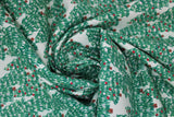 Swirled swatch Trees fabric (light green fabric with tossed green evergreen style drawn look trees allover some with red berries)
