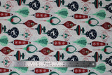 Flat swatch Ornaments fabric (white fabric with bulb and carrot shaped christmas ornaments allover in green, red and navy with christmas related graphics: deer, santa heads, holly, trees, etc.)