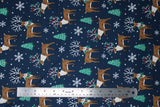 Flat swatch Reindeer fabric (navy fabric with tossed brown reindeer with tree branch antlers, some with red and green holly/leaves, tossed green trees and white snowflakes and dots)