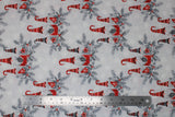 Flat swatch Gnome Friends fabric (white and grey subtle marbled look fabric with repeated pattern of 3 gnomes in red christmas outfits with faces covered, nose visible on grey tree branches)