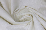 Swirled swatch white cotton fabric in style pebble (tiny white rock shapes pattern)