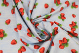 Swirled swatch berry print fabric in tossed strawberries