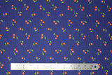 Flat swatch berry print fabric in tossed cherries