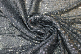 Swirled swatch Sequins Upholstery Fabric (dark grey fabric with tight lines of grey/charcoal sequins allover)