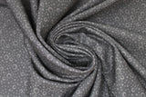 Swirled swatch bubbles fabric (dark grey fabric with light grey circular bubble style dots allover in small and medium)