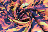 Swirled swatch layered flames fabric (black fabric with small layered realistic looking orange and yellow flames allover)