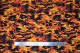 Flat swatch layered flames fabric (black fabric with small layered realistic looking orange and yellow flames allover)