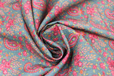 Swirled swatch English Autumn fabric (faded denim coloured fabric with deep pink/fuchsia paisley floral pattern with greenery)