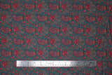 Flat swatch English Autumn fabric (faded denim coloured fabric with deep pink/fuchsia paisley floral pattern with greenery)