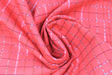 Swirled swatch shimmer graph fabric (bright red fabric with grid lines in faded black/grey and shimmering silver)