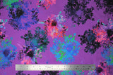Flat swatch bright floral print in orchid (bright medium purple fabric with large floral head splashes in navy/blue/turquoise/lime/pink)