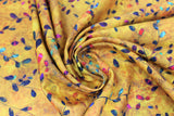 Swirled swatch venice lawns fabric in yellow (gold yellow marbled fabric with thin leafy design allover in green, purple, pink allover)