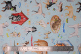 Flat swatch dog themed fabric print think pawsitive in light blue (light blue fabric with assorted dogs, dog houses and beds, bones, balls, leashes, collars, in various colours)