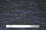 Flat swatch blue and black fabric (abstract paint look fabric on black with dark blue stripe like abstract shapes)