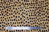 Flat swatch cheetah print fabric (pale gold/yellow fabric with black cheetah stripes and fur look texture)
